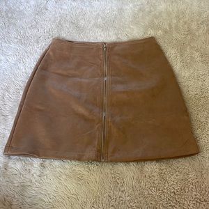 Tan mini skirt with middle zipper